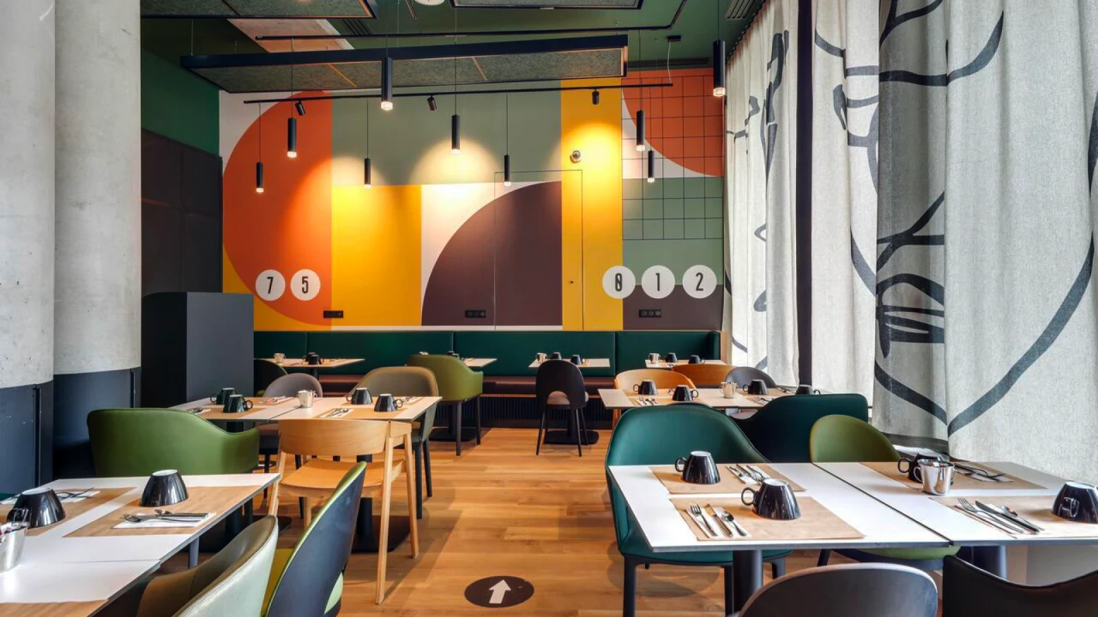 Modern restaurant space at Novotel Gare de Lyon redesigned by Saguez & Dash